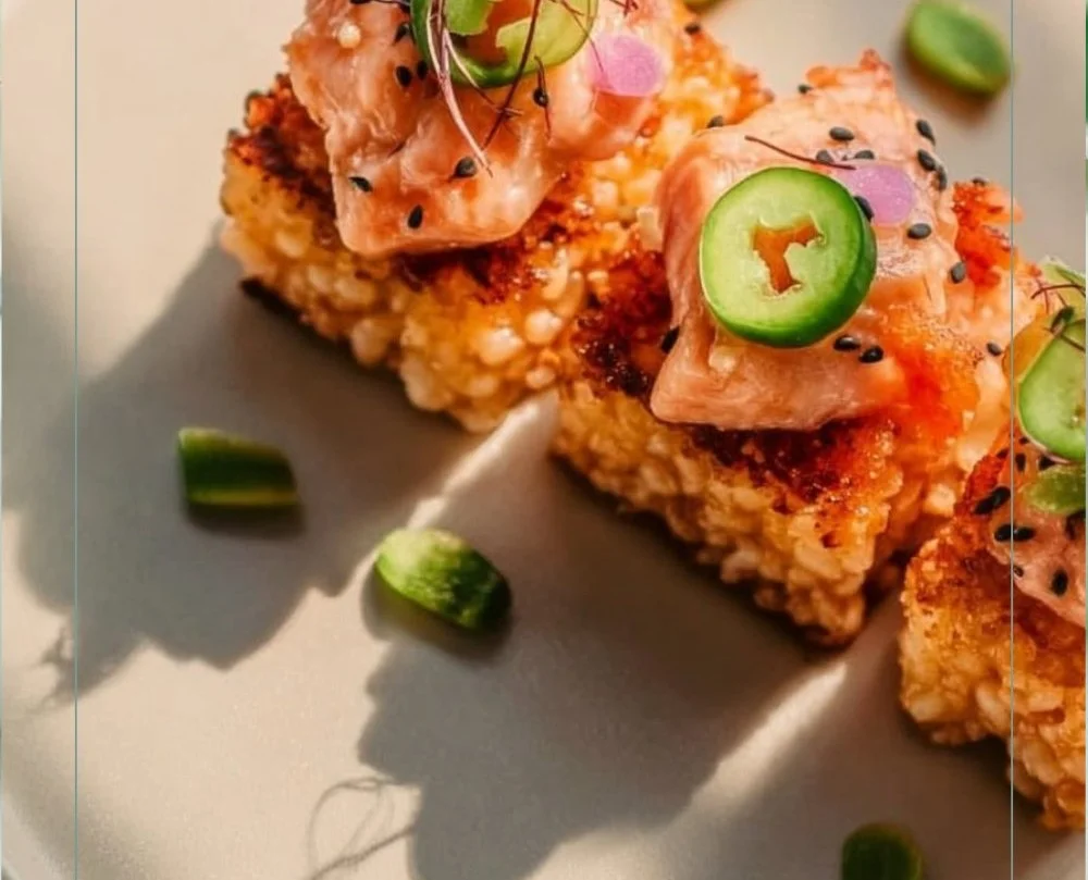 Delicious salmon crispy rice topped with fresh ingredients.