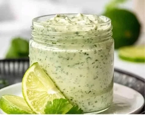 Homemade garlic aioli in a bowl, perfect for dipping and adding flavor to dishes.