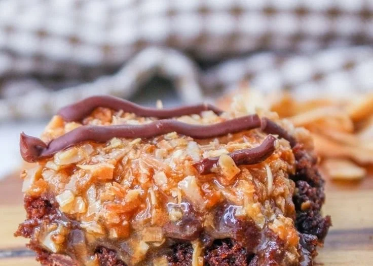 Delicious Samoa Brownies topped with caramel and toasted coconut